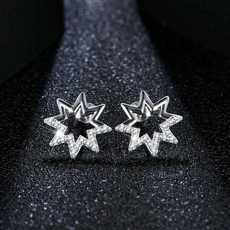 silver moissanite earrings classic simple studs shaped as a star with multiple small moissanite stones gram moissanite for a timeless appeal