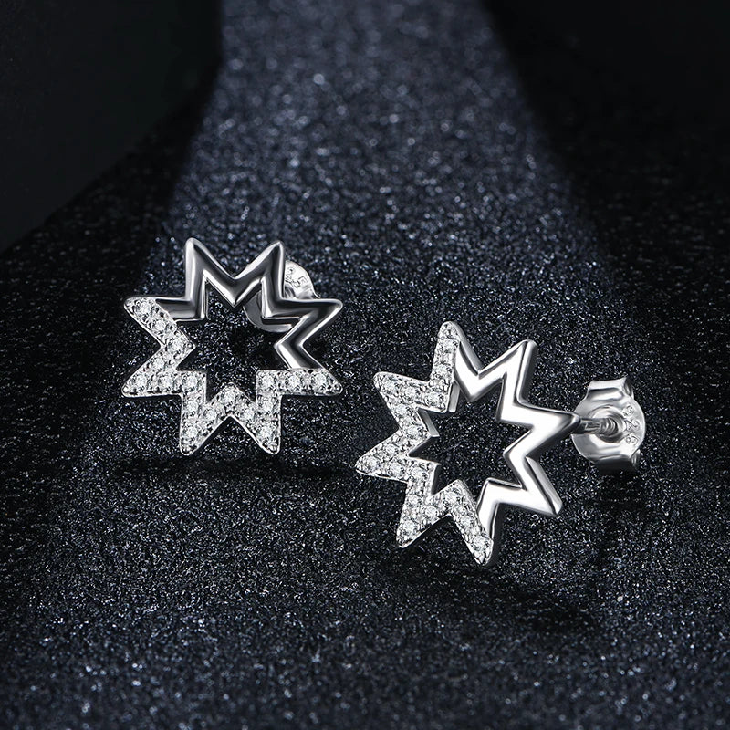 silver moissanite earrings elegant simple studs shaped as a star with multiple small moissanite stones lab created diamonds for a bright finish