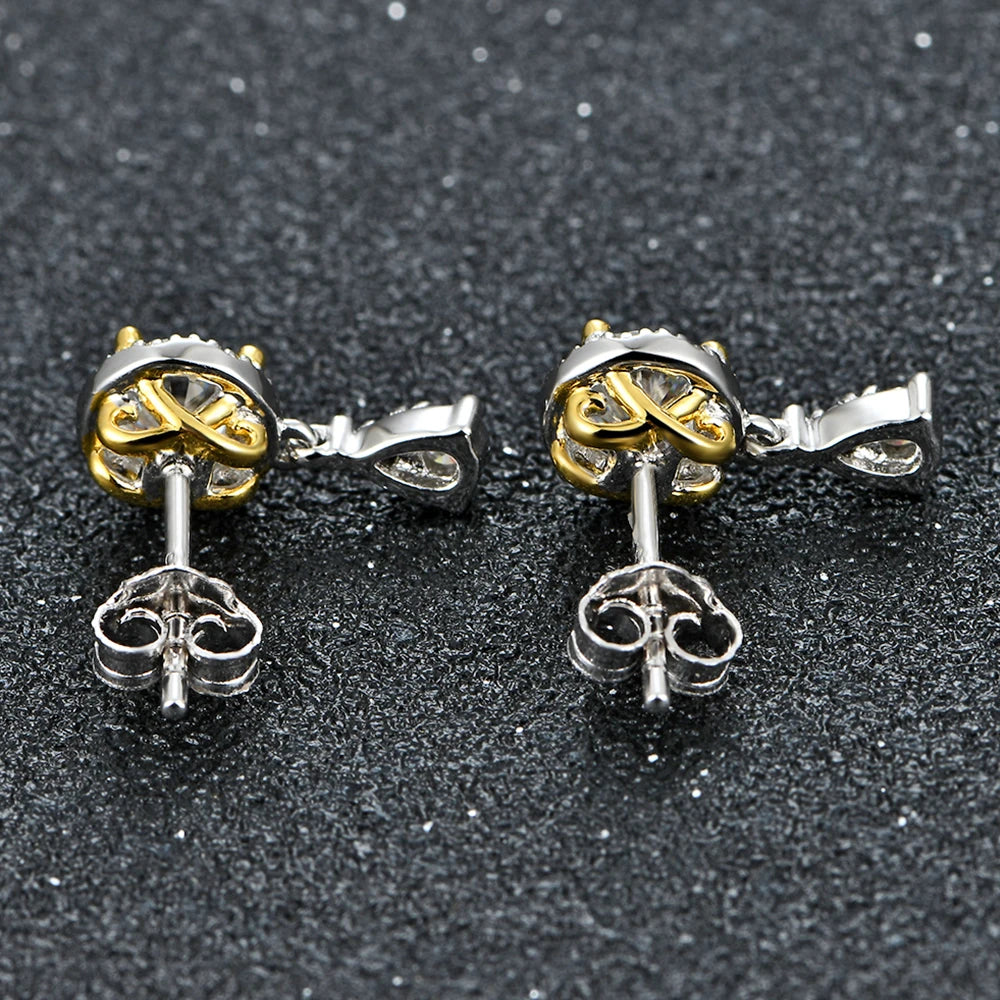 silver and gold moissanite earrings bold clepsydra drop concept infinity jewelry for a distinctive and eye-catching style