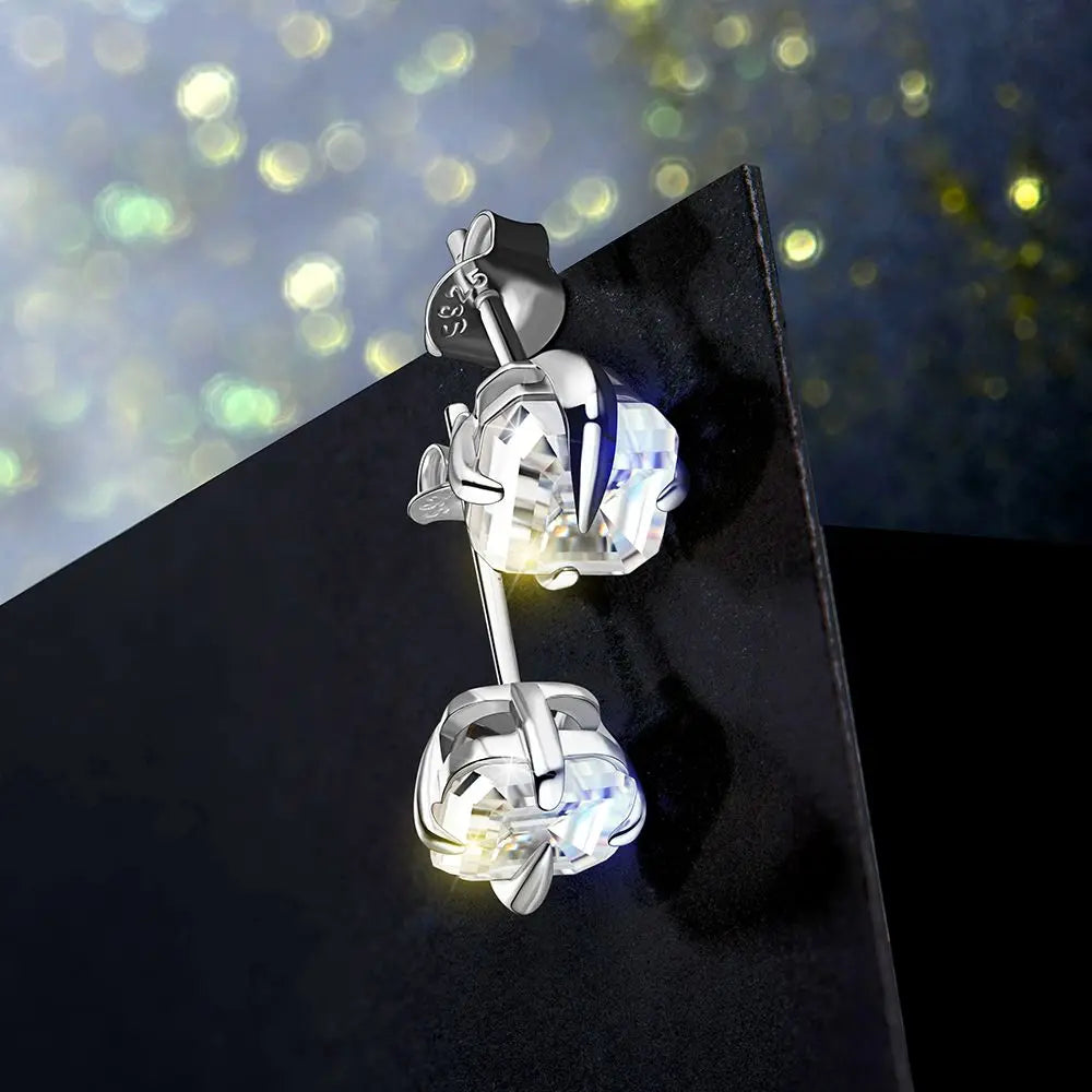 Classic silver Asscher cut moissanite earrings, perfect for daily elegance.