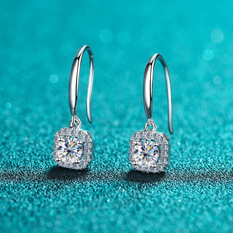 silver moissanite earrings elegant drop earrings with a larger stone in the middle and smaller on the sides lab created diamonds for a dazzling effect