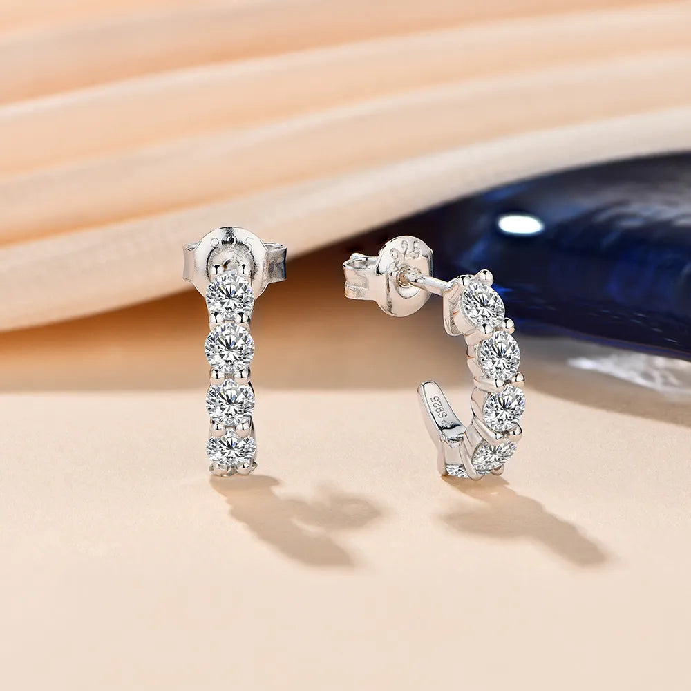silver moissanite earrings with a stylish loop shape infinity diamond jewellery for added elegance