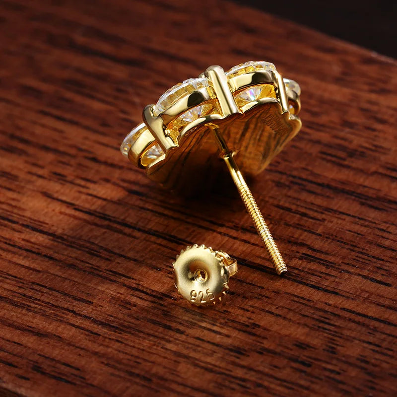 gold moissanite earrings with gram moissanite creating a bold and elegant design
