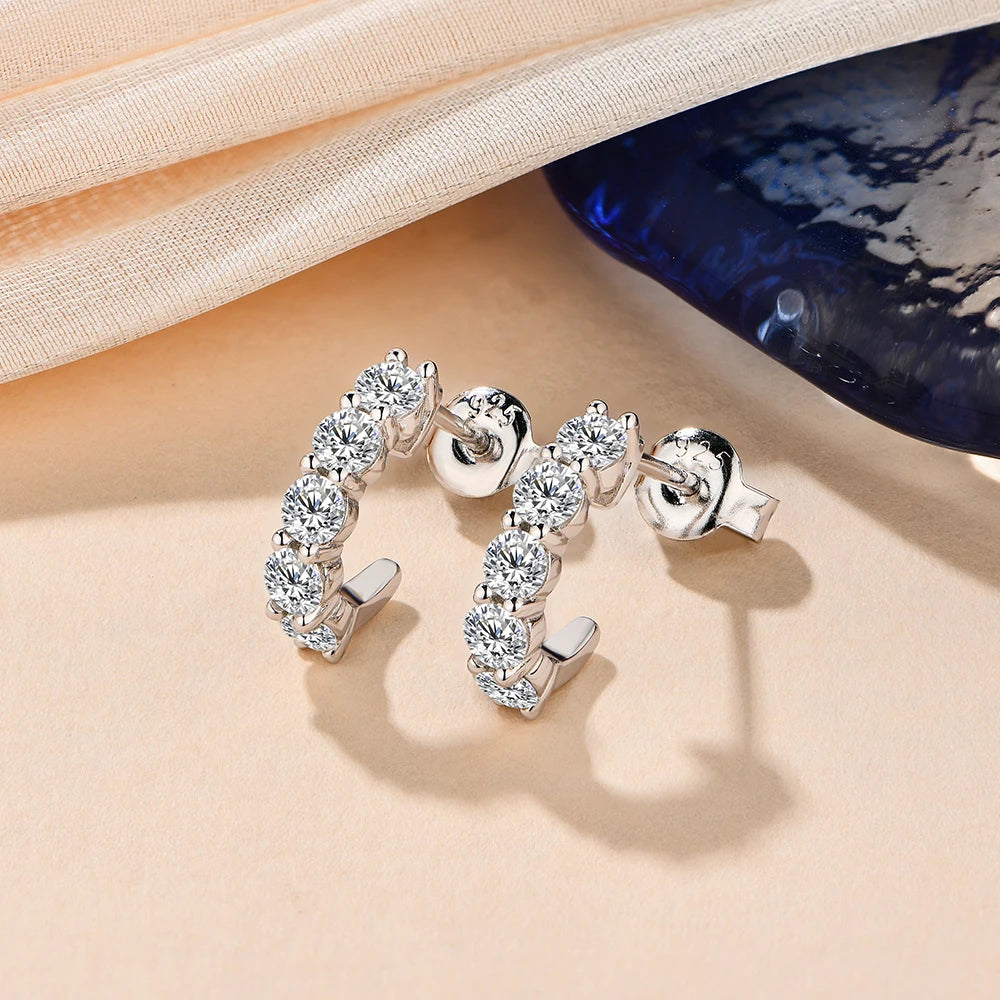 silver moissanite earrings incorporating a loop-inspired style infinity jewelry for nature-inspired beauty