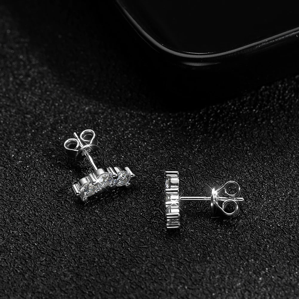 silver moissanite earrings showcasing three stones dropping infinity jewelry for a modern and stylish appeal