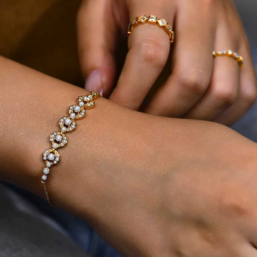 a delicate gold diamond bracelet using moissanite stones, ideal for both casual and formal occasions.