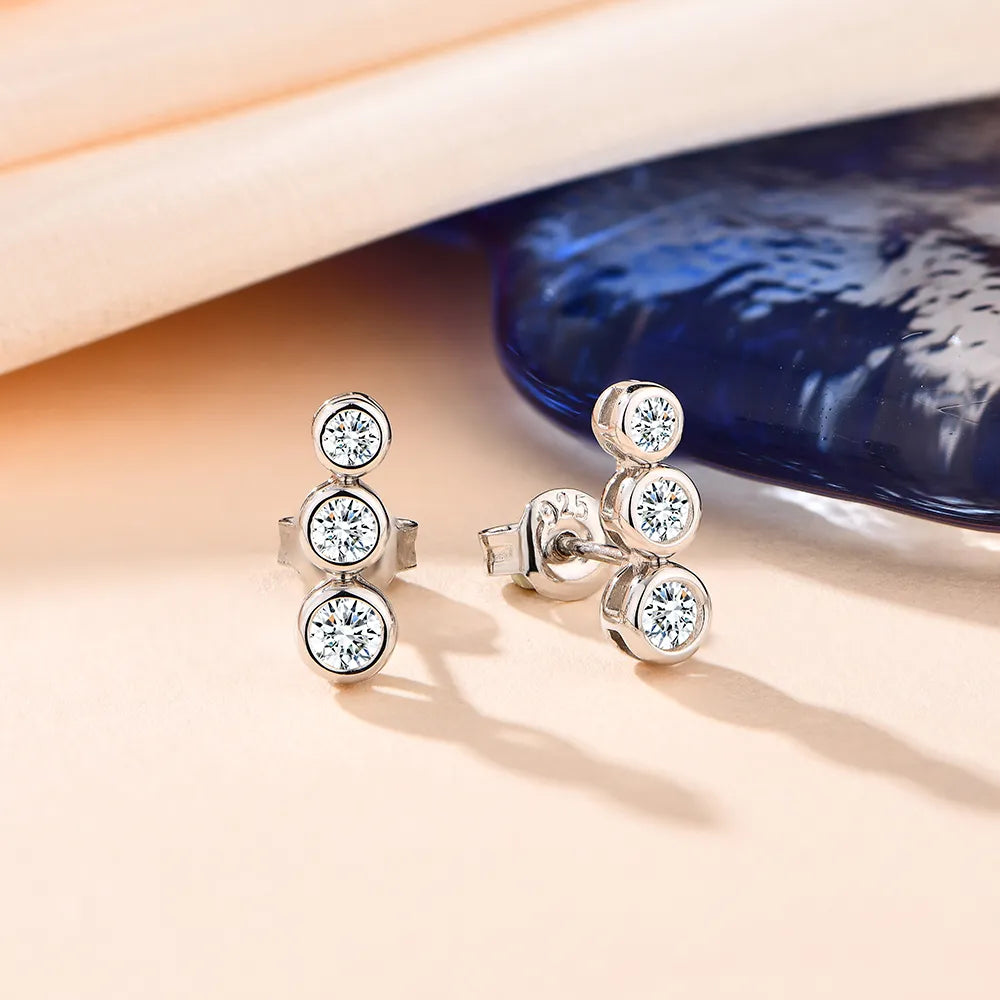 silver moissanite stud earrings sleek trio of three stones gram moissanite for a polished and modern finish