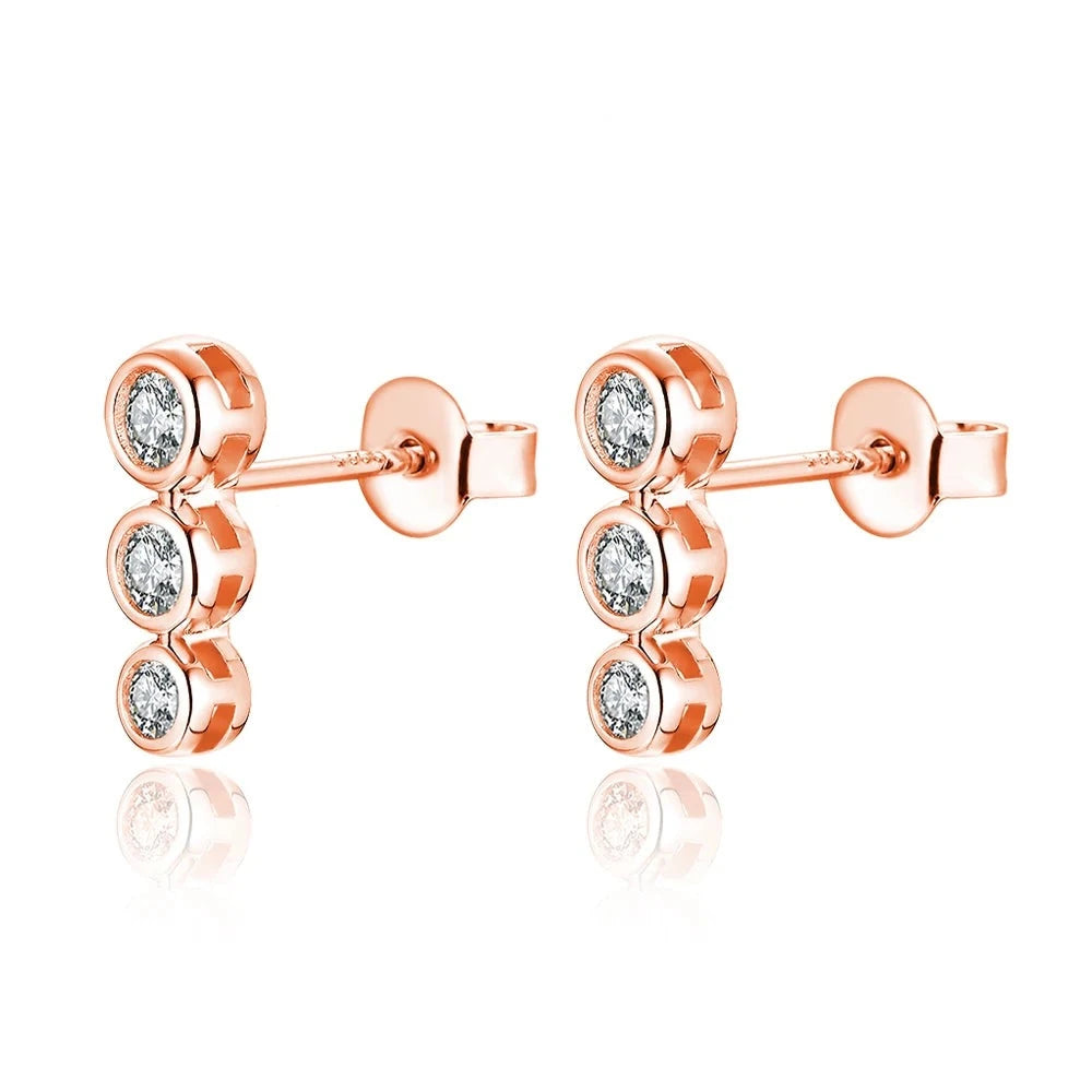 gold moissanite round earrings sophisticated trio of three stones infinity diamond jewellery for a refined finish