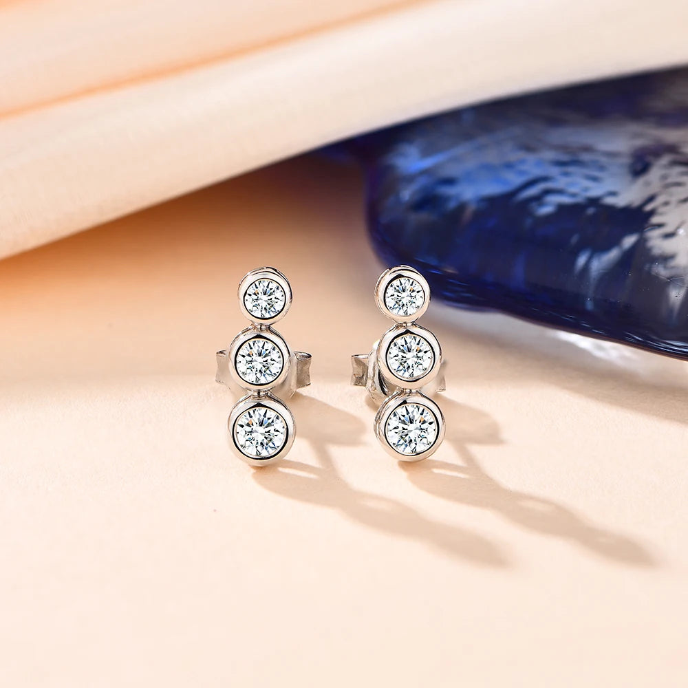 silver moissanite earrings delicate trio of three stones lab created diamonds for everyday elegance
