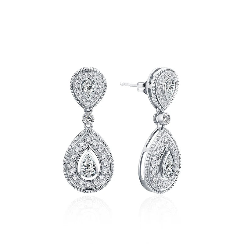 trendy silver moissanite huggie earrings with a modern and sleek design.