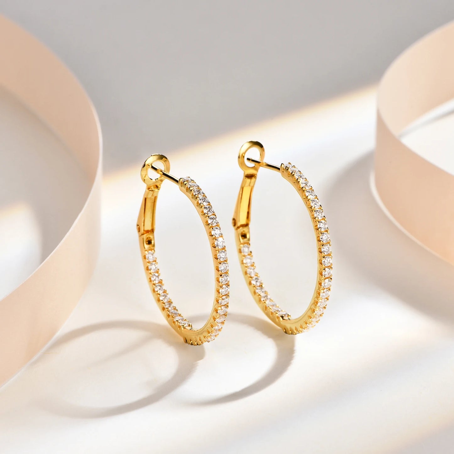 chic silver moissanite hoop earrings for a modern and stylish look.