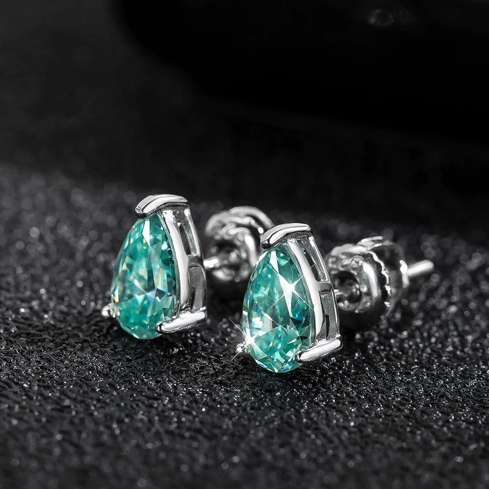 silver moissanite vintage earrings adorned with green pear moissanite lab created diamonds for a classic appeal